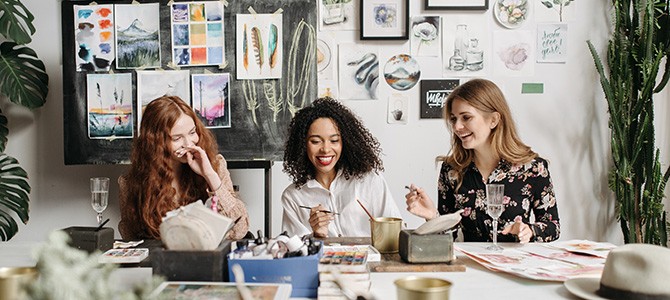 three women working a table