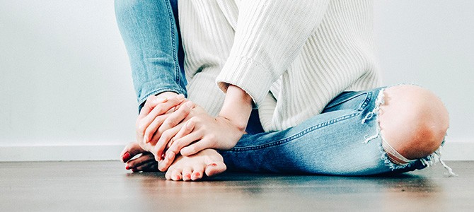 girl sitting on the floor; Photo by Imani Clovis on Unsplash 