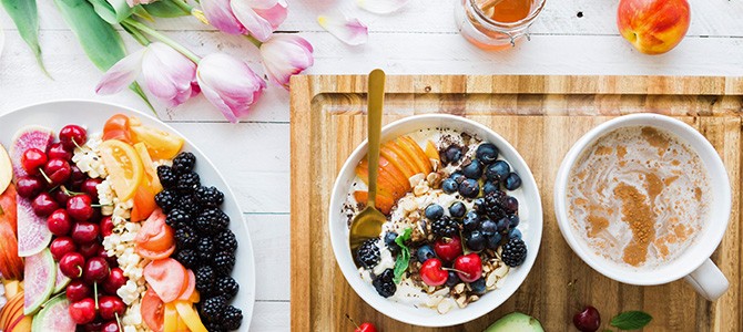 table of healthy foods; Photo by Brooke Lark on Unsplash 