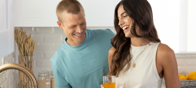 man and woman taking a collagen supplement